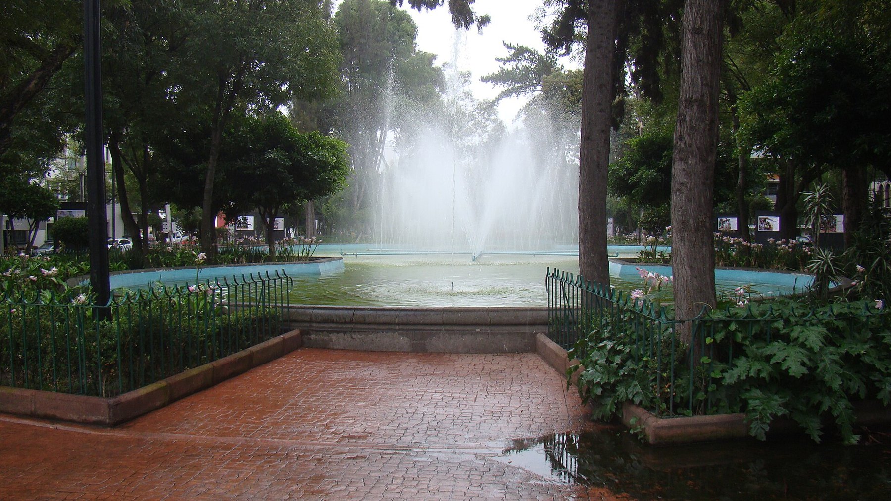 Fountain and planted paths at Plaza Luis Cabrera, Roma Norte